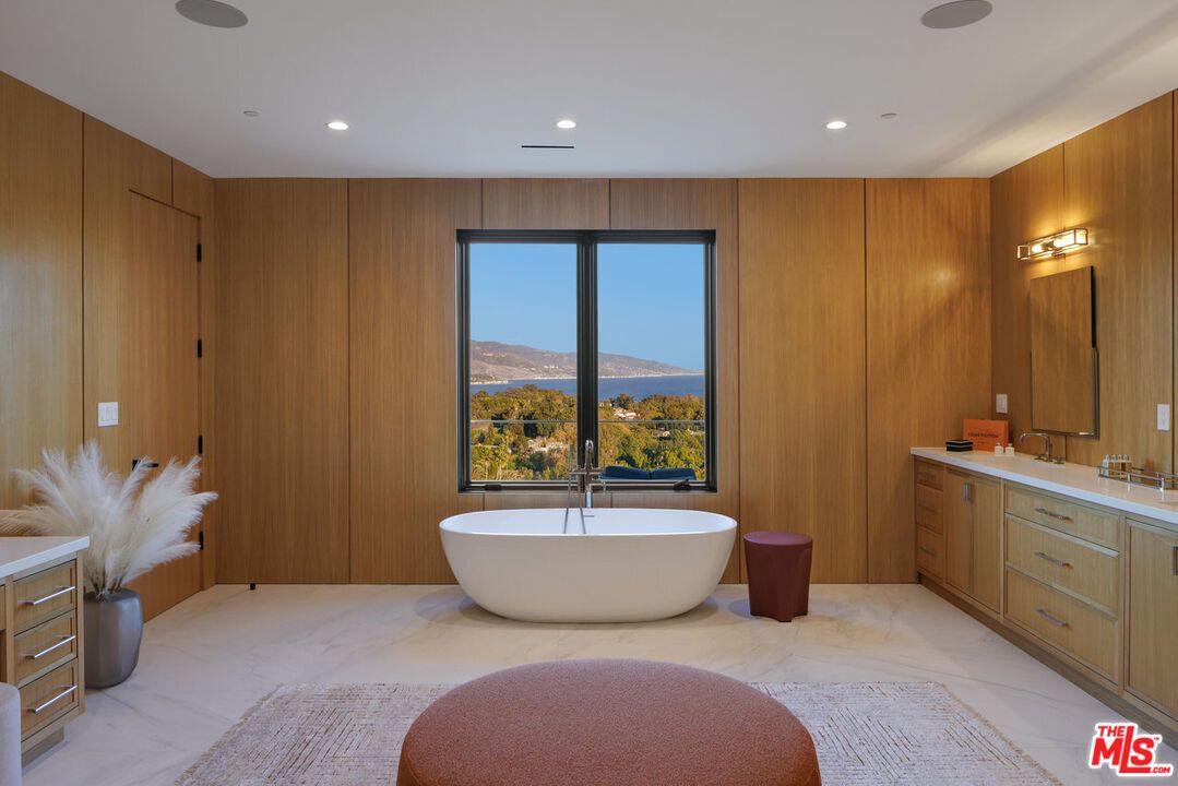 Bathroom, Dual Sink Vanities, Free Standing Baths, Interior, Marble, Recessed Lighting, Wooden Walls