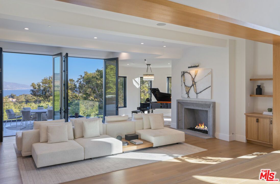 Dining room, Fireplace, Interior, Living room, Pendant Lights, Piano, Recessed Lighting, Water, Wood Texture Flooring
