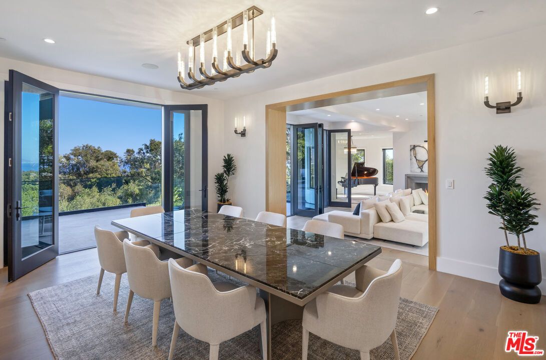 Chandelier, Dining room, Fireplace, Interior, Living room, Recessed Lighting, Wood Texture Flooring