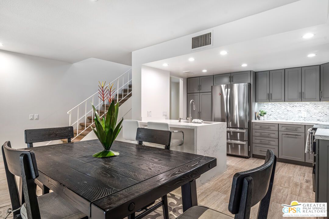 Dining room, Interior, Kitchen, Recessed Lighting, Stainless Steel Appliances, Wood Texture Flooring