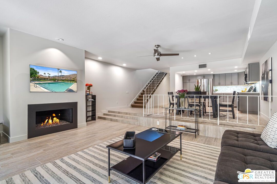 Dining room, Fireplace, Interior, Kitchen, Living room, Recessed Lighting, Wood Texture Flooring