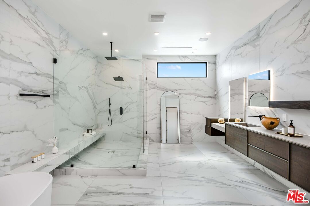 Bathroom, Dual Sink Vanities, Glass Shower, Interior, Marble, Marble Walls, Recessed Lighting