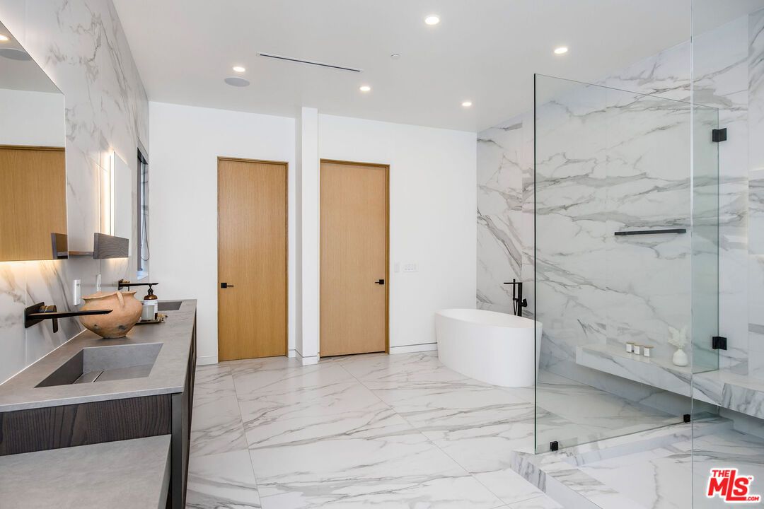 Bathroom, Free Standing Baths, Glass Shower, Interior, Marble, Marble Walls, Recessed Lighting