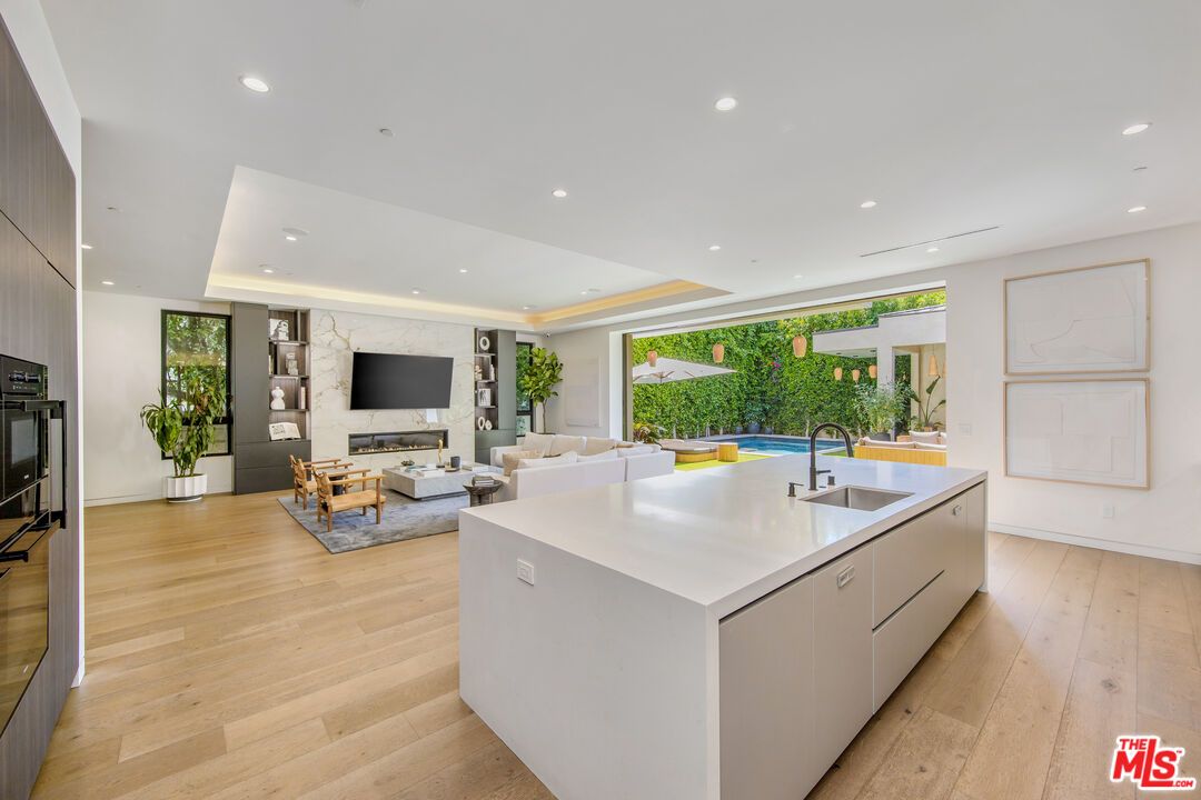 Fireplace, Interior, Kitchen, Living room, Recessed Lighting, Wood Texture Flooring