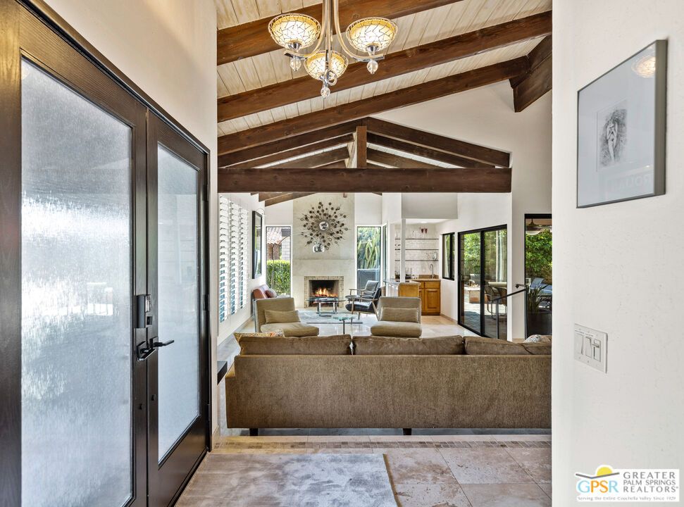 Chandelier, Fireplace, Interior, Living room, Wooden Beams