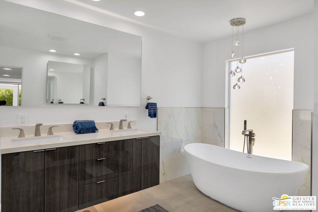 Bathroom, Dual Sink Vanities, Free Standing Baths, Interior, Marble Walls, Pendant Lights, Recessed Lighting