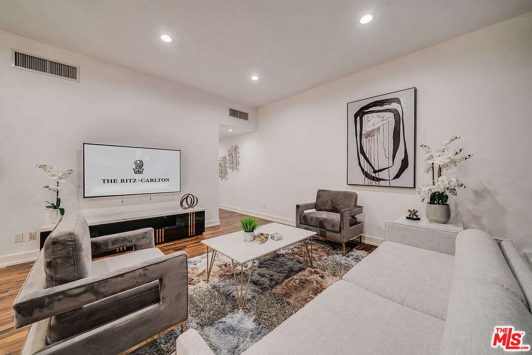 Fireplace, Interior, Living room, Recessed Lighting, Wood Texture Flooring