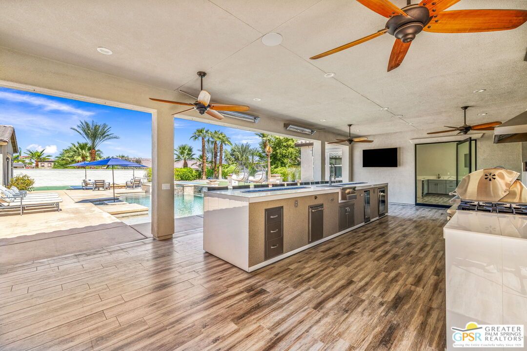 Exterior, Outdoor Kitchen, Pool, Recessed Lighting, Wood Texture Flooring