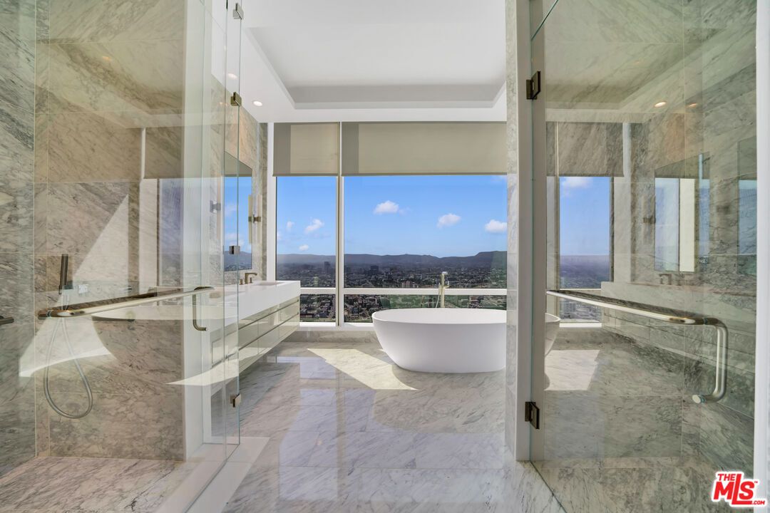 Bathroom, Free Standing Baths, Glass Shower, Interior, Marble, Marble Walls, Recessed Lighting