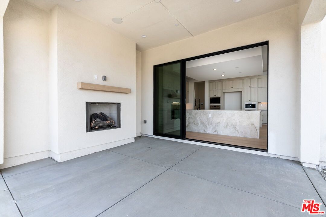 Exterior, Fireplace, Kitchen, Recessed Lighting