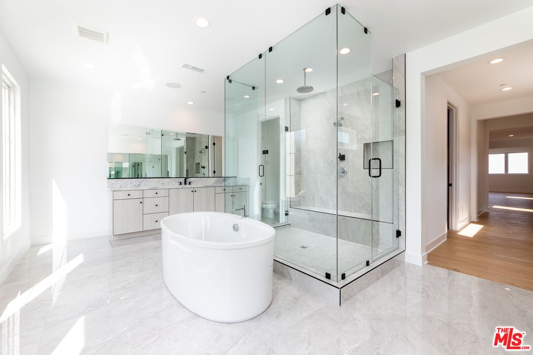 Bathroom, Free Standing Baths, Glass Shower, Interior, Marble, Recessed Lighting, Wood Texture Flooring