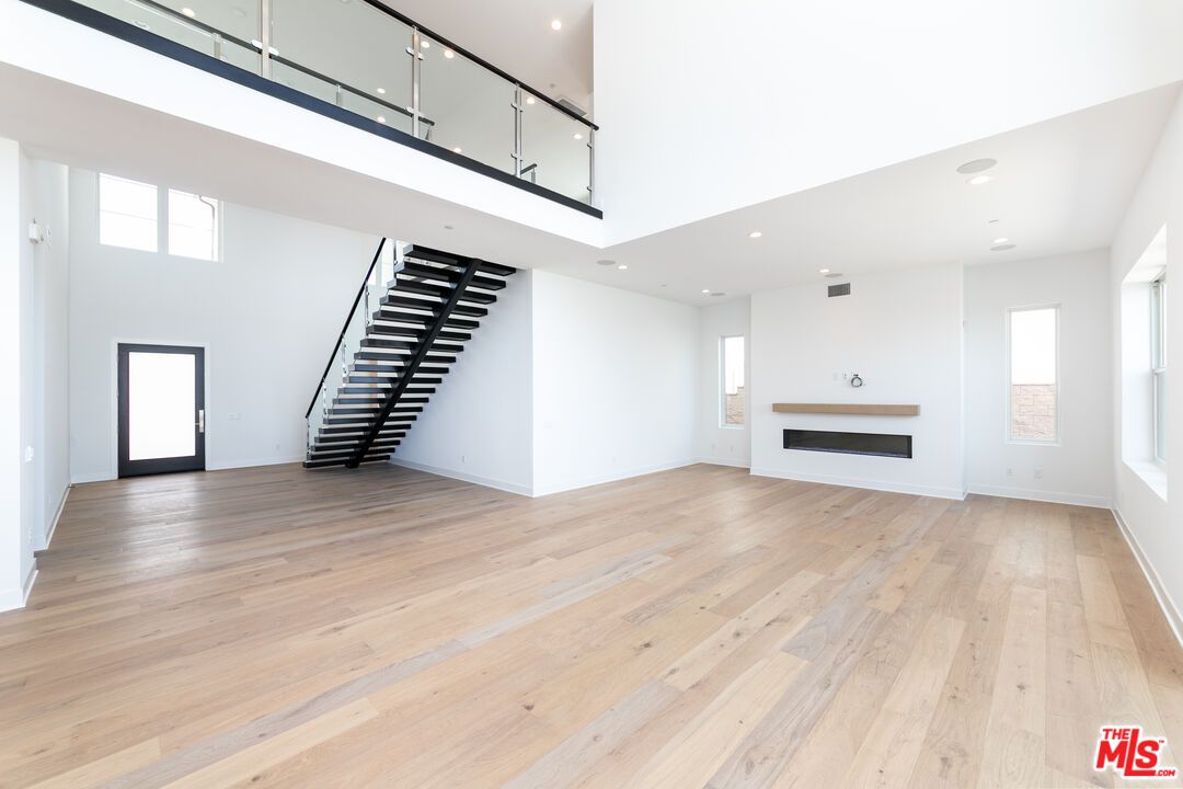 Empty room, Fireplace, Interior, Recessed Lighting, Wood Texture Flooring