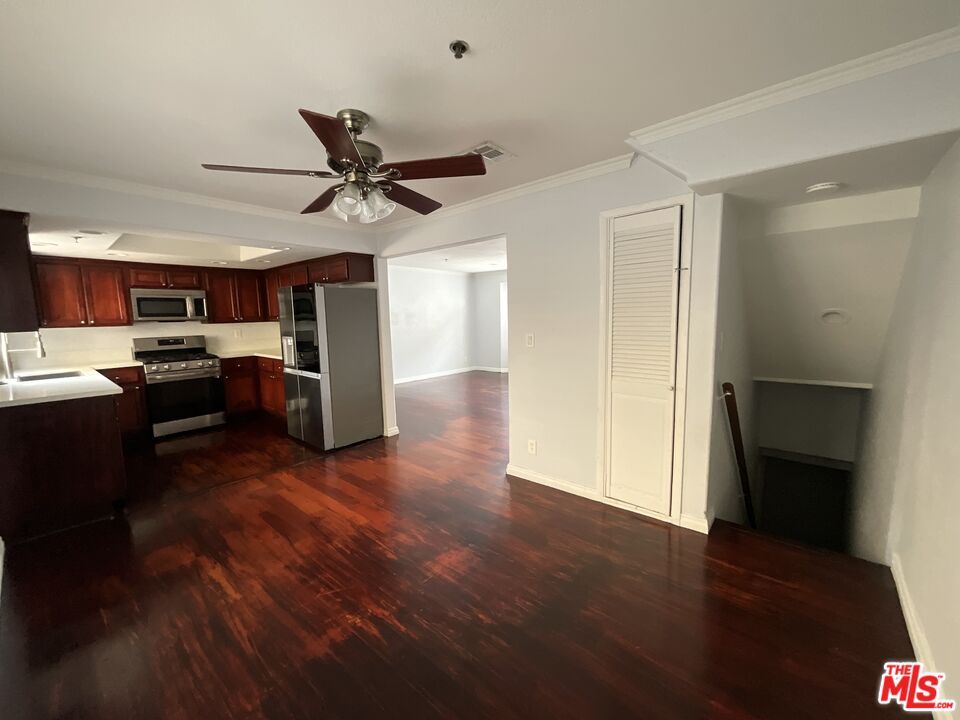 Empty room, Interior, Kitchen, Stainless Steel Appliances, Wood Texture Flooring