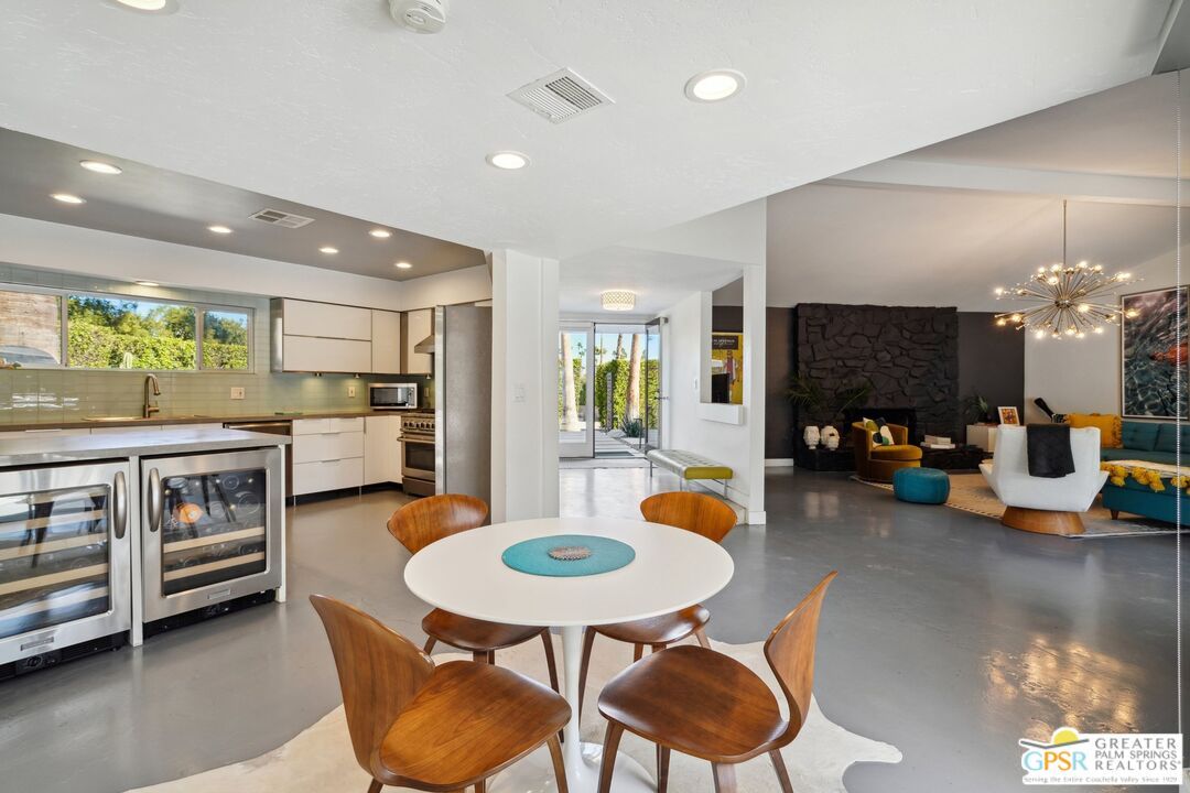 Dining room, Fireplace, Interior, Kitchen, Pendant Lights, Recessed Lighting, Stainless Steel Appliances, Stone Walls
