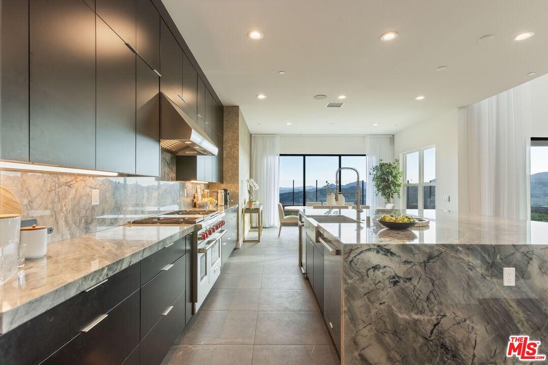 Interior, Kitchen, Marble Walls, Recessed Lighting, Stainless Steel Appliances, Water