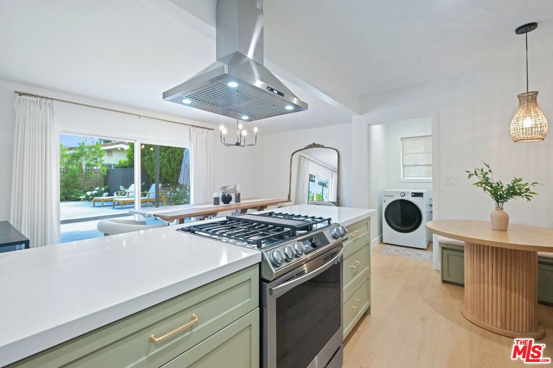 Interior, Kitchen, Pendant Lights, Stainless Steel Appliances, Washer, Wood Texture Flooring