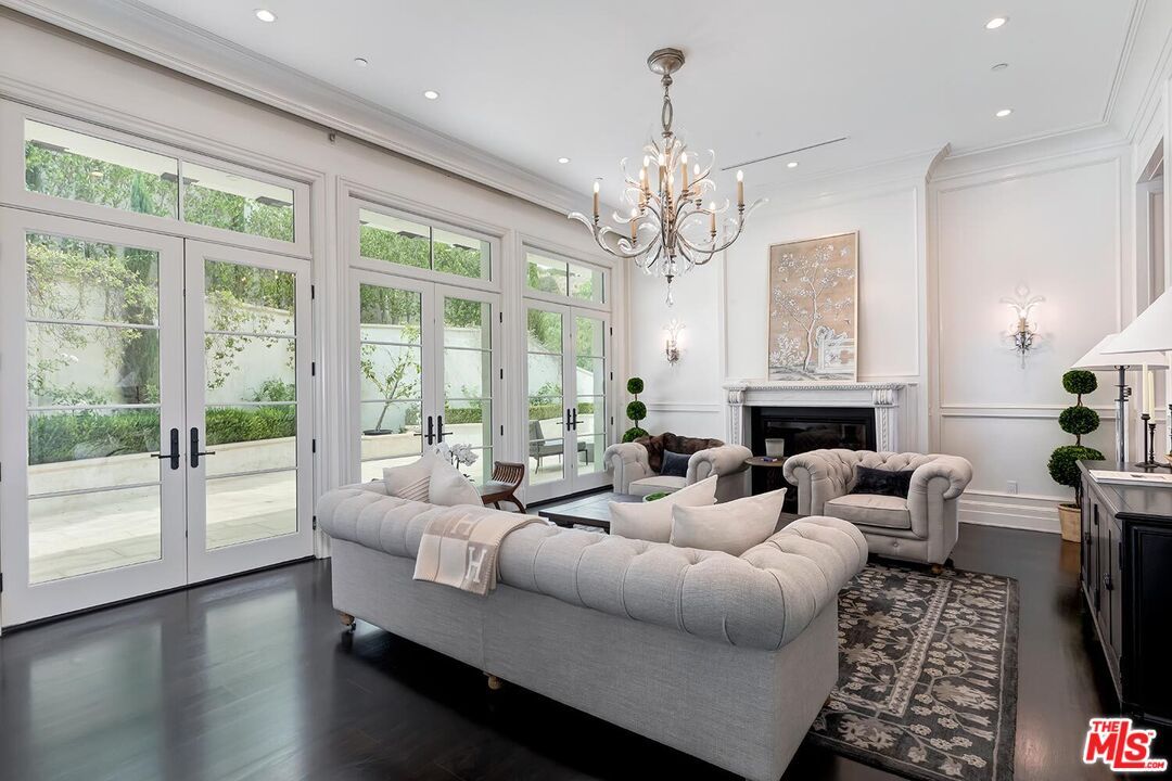 Chandelier, Fireplace, Interior, Living room, Recessed Lighting, Wood Texture Flooring