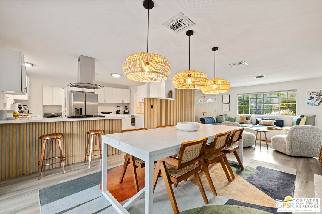 Chandelier, Dining room, Interior, Kitchen, Living room, Pendant Lights, Recessed Lighting, Stainless Steel Appliances, Wood Texture Flooring