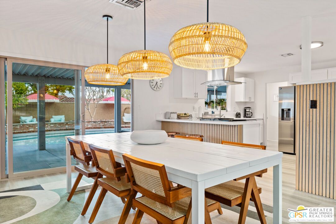 Chandelier, Dining room, Interior, Kitchen, Pendant Lights, Recessed Lighting, Stainless Steel Appliances