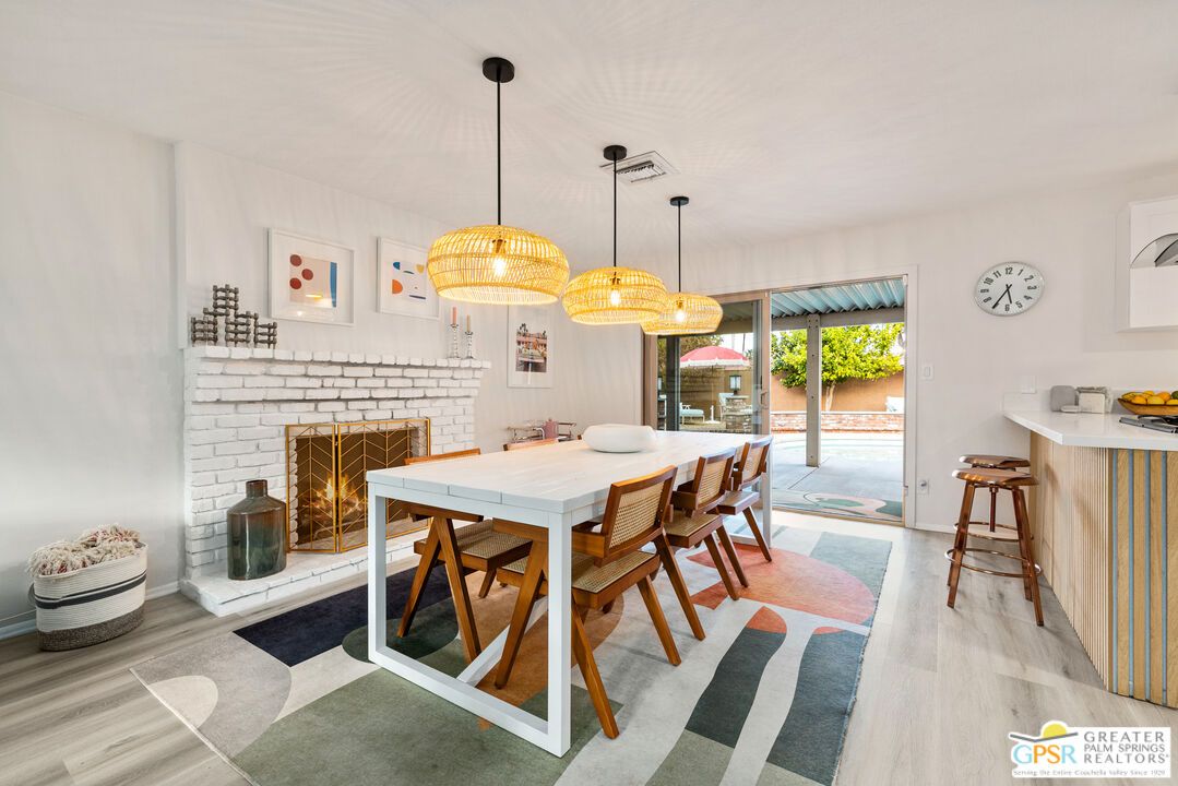Dining room, Fireplace, Interior, Pendant Lights, Wood Texture Flooring