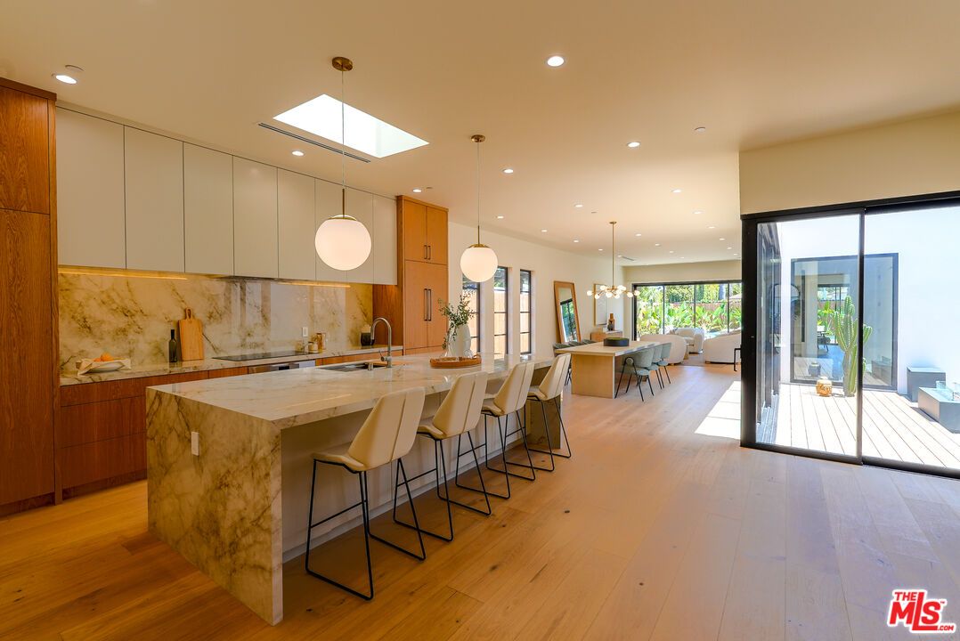 Dining room, Interior, Kitchen, Marble Walls, Pendant Lights, Recessed Lighting, Wood Texture Flooring