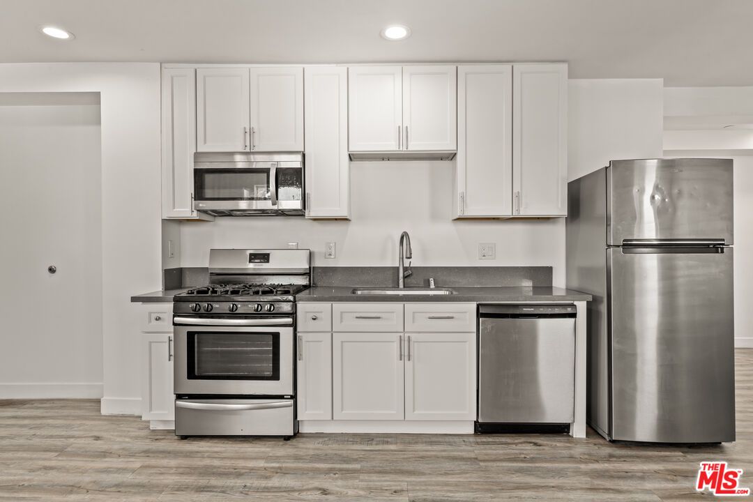 Interior, Kitchen, Recessed Lighting, Stainless Steel Appliances, Wood Texture Flooring