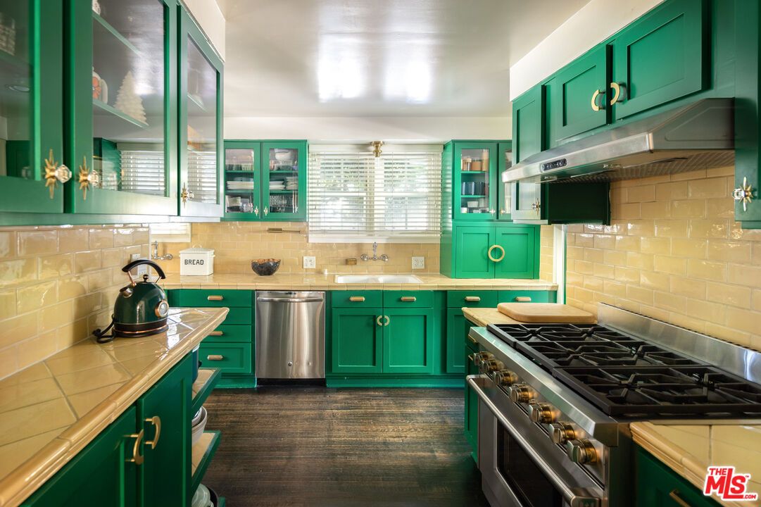 Interior, Kitchen, Stainless Steel Appliances, Tile Countertops, Wood Texture Flooring