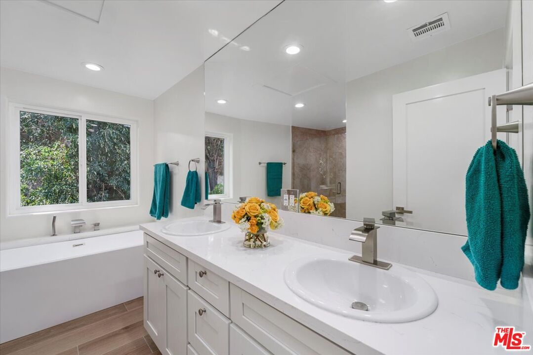 Bathroom, Dual Sink Vanities, Interior, Recessed Lighting, Wood Texture Flooring