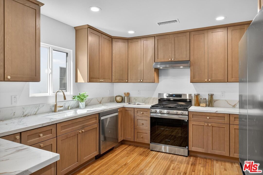 Interior, Kitchen, Recessed Lighting, Stainless Steel Appliances, Wood Texture Flooring
