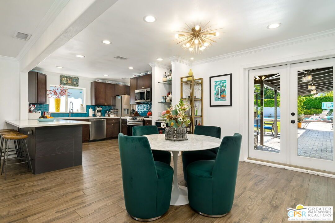Dining room, Interior, Kitchen, Pendant Lights, Recessed Lighting, Stainless Steel Appliances, Wood Texture Flooring
