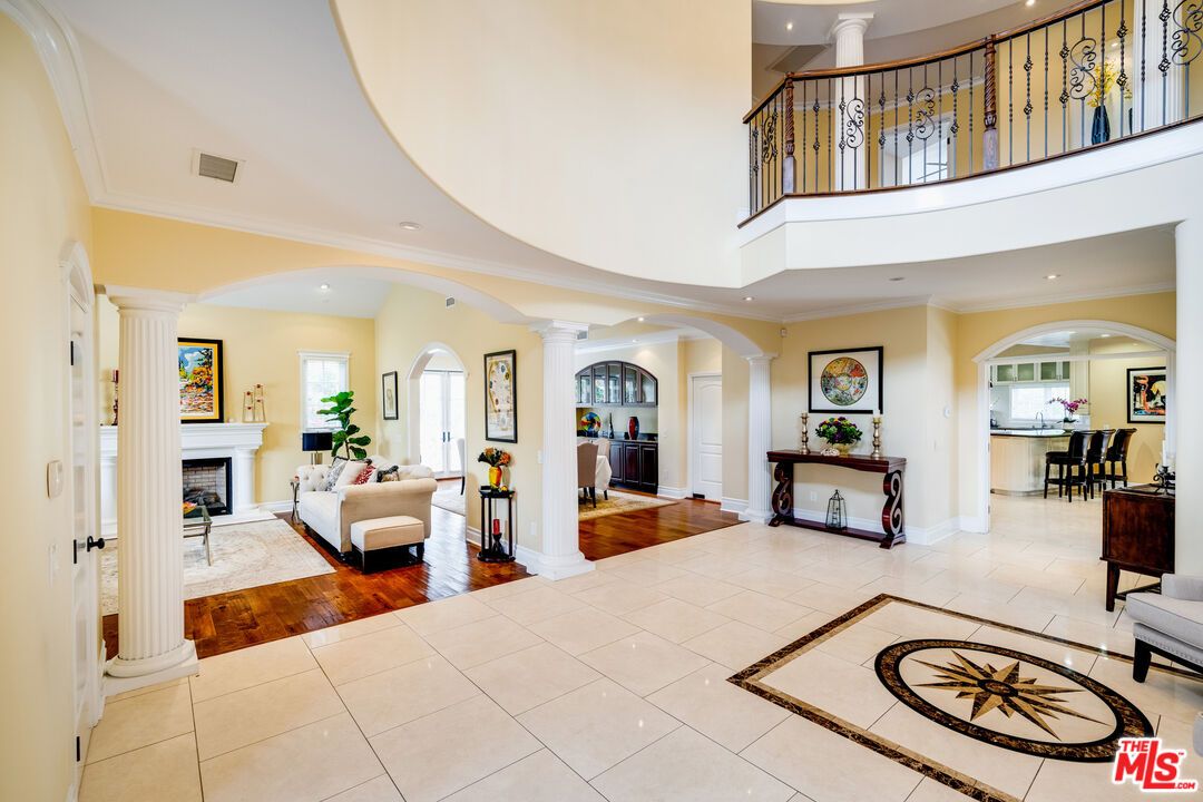 Dining room, Fireplace, Interior, Living room, Recessed Lighting, Wood Texture Flooring