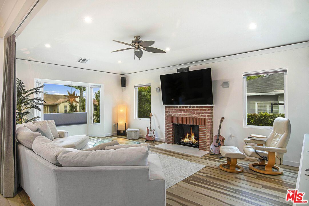 Fireplace, Interior, Living room, Recessed Lighting, Wood Texture Flooring