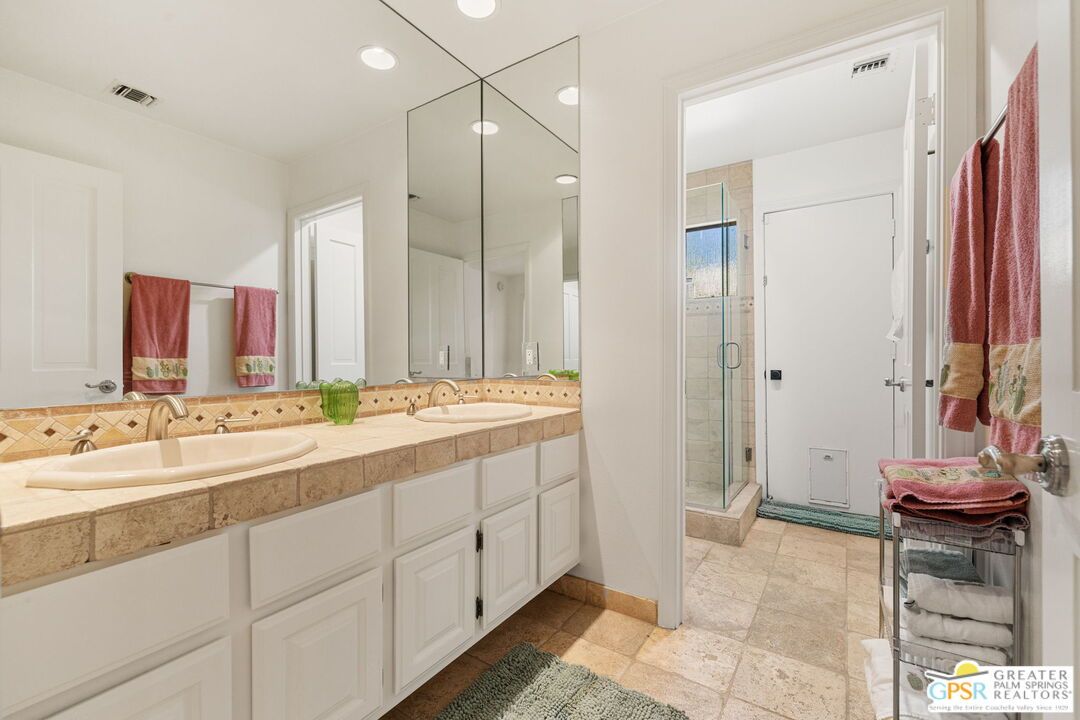 Bathroom, Dual Sink Vanities, Glass Shower, Interior, Recessed Lighting, Tile Countertops