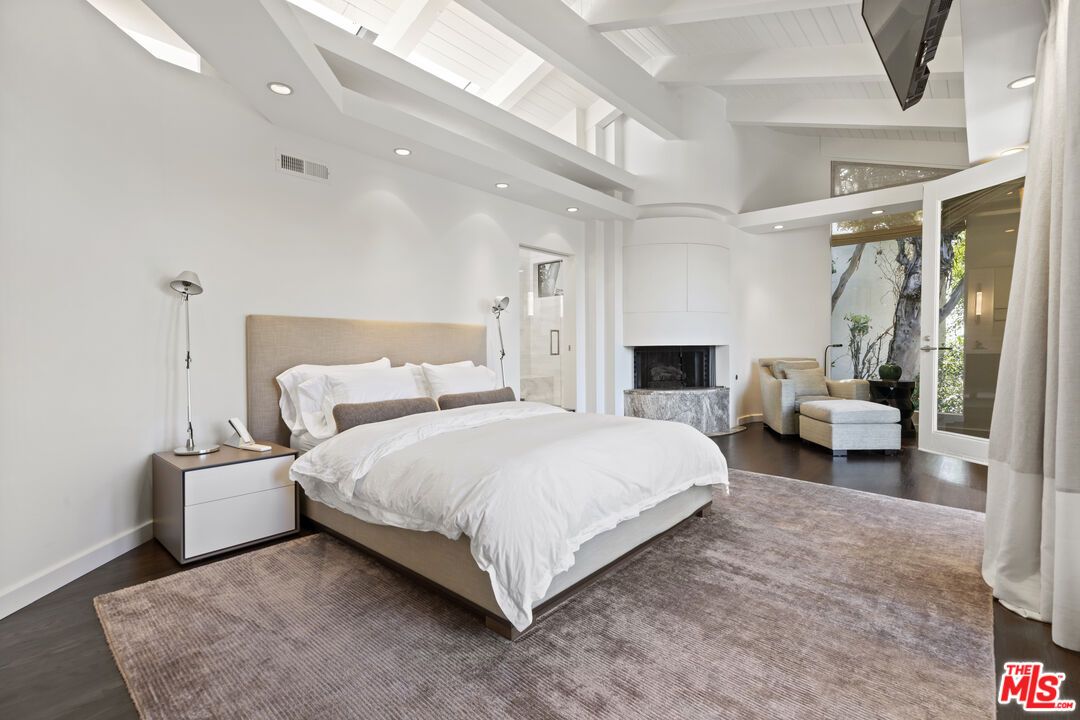 Bedroom, Fireplace, Interior, Recessed Lighting, Wood Texture Flooring