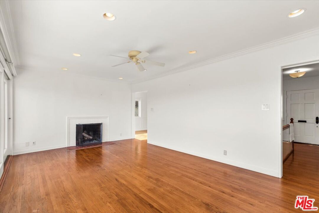 Empty room, Fireplace, Interior, Recessed Lighting, Wood Texture Flooring
