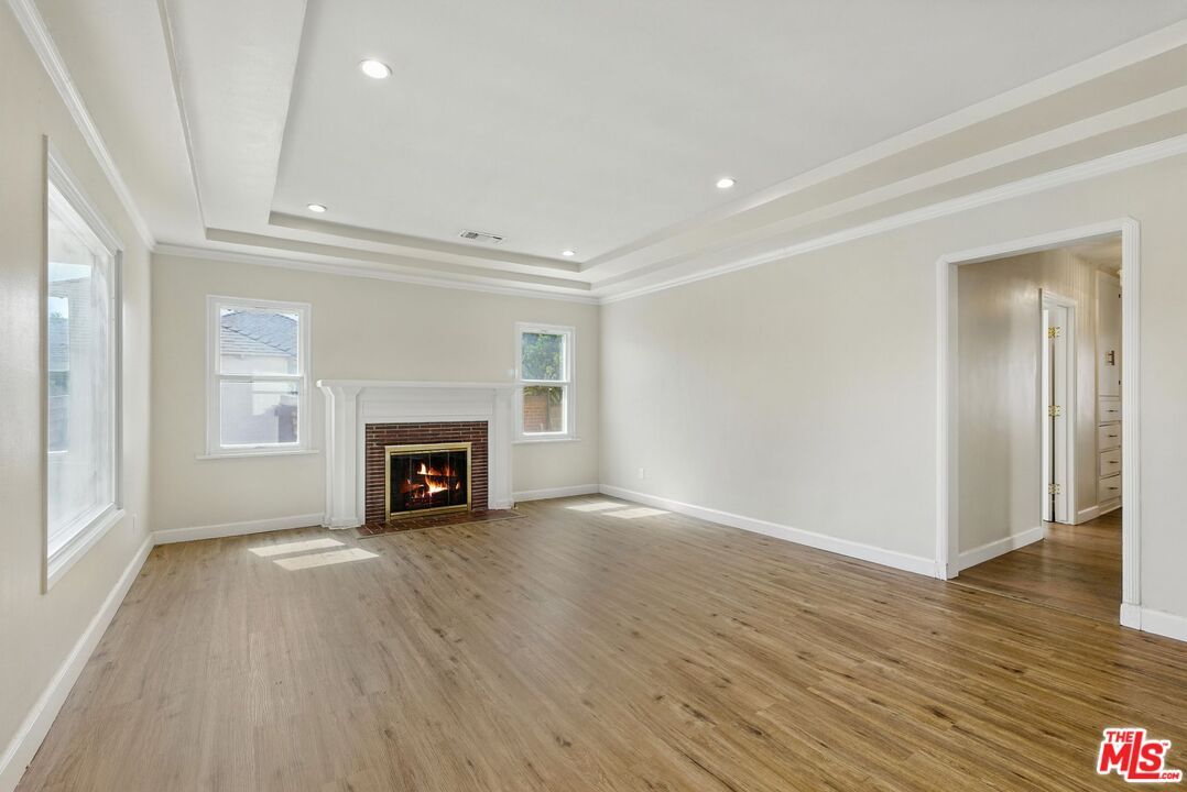 Empty room, Fireplace, Interior, Recessed Lighting, Wood Texture Flooring