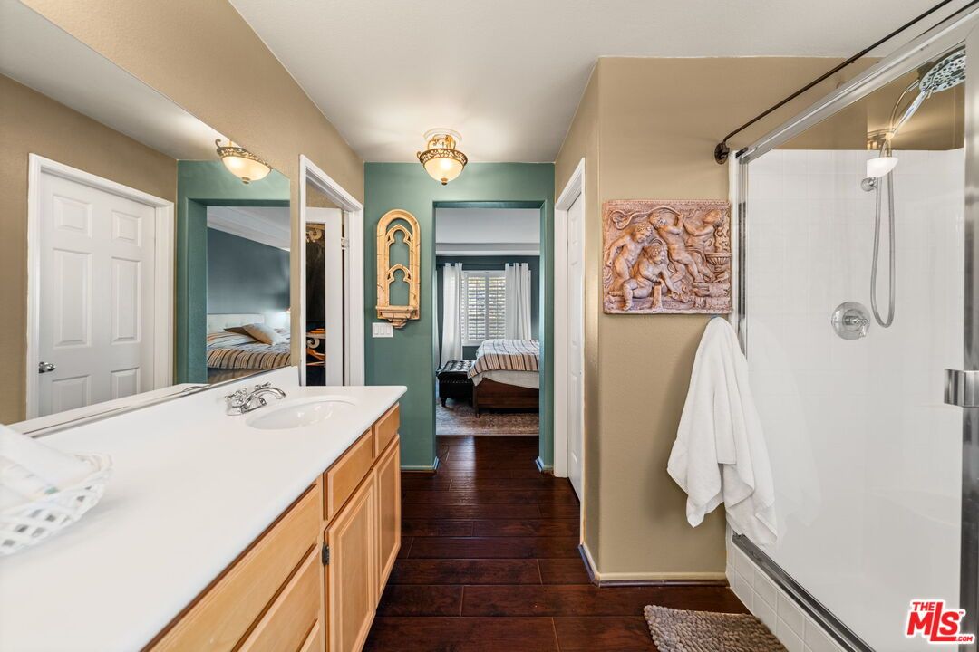 Bathroom, Bedroom, Dual Sink Vanities, Glass Shower, Interior, Wood Texture Flooring
