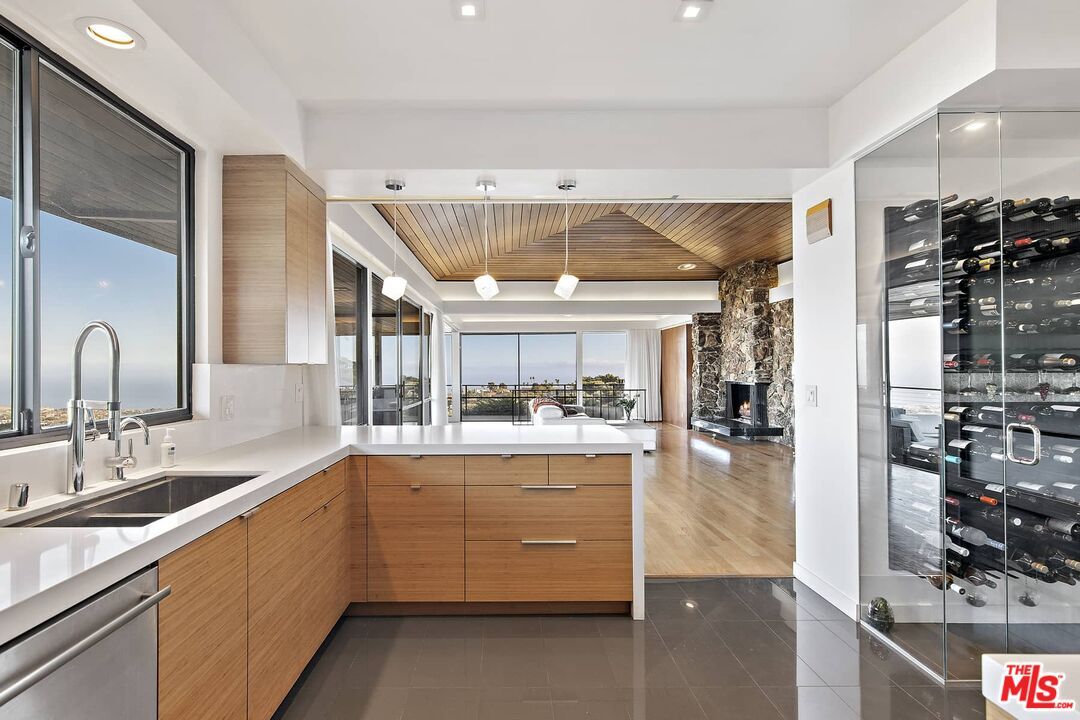 Fireplace, Interior, Kitchen, Pendant Lights, Recessed Lighting, Stainless Steel Appliances, Wine Storage, Wooden Ceilings, Wood Texture Flooring