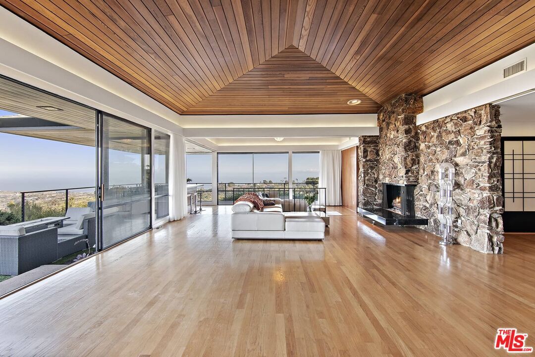 Fireplace, Interior, Living room, Recessed Lighting, Stone Walls, Wooden Ceilings, Wood Texture Flooring