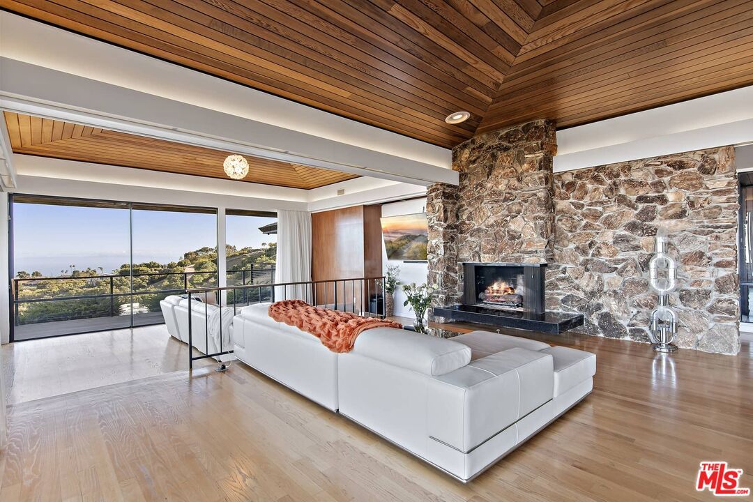 Fireplace, Interior, Living room, Recessed Lighting, Stone Walls, Wooden Ceilings, Wood Texture Flooring