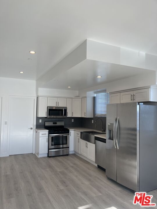 Interior, Kitchen, Recessed Lighting, Stainless Steel Appliances, Wood Texture Flooring