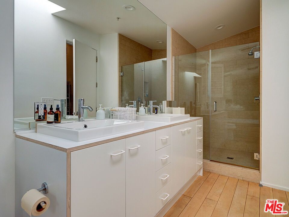 Bathroom, Dual Sink Vanities, Glass Shower, Interior, Recessed Lighting, Wood Texture Flooring