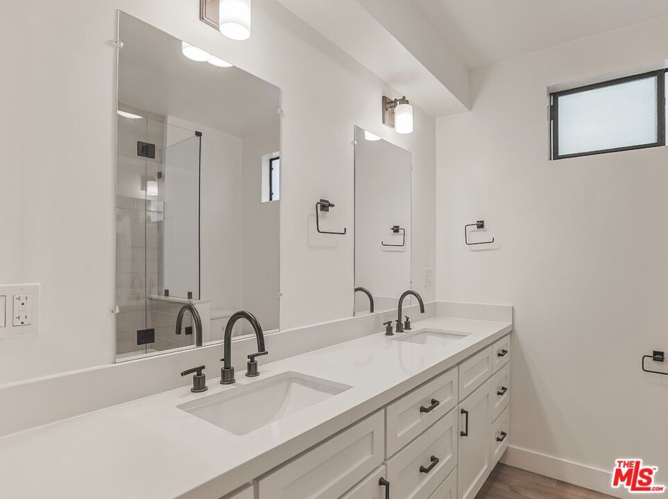 Bathroom, Dual Sink Vanities, Glass Shower, Interior, Wood Texture Flooring