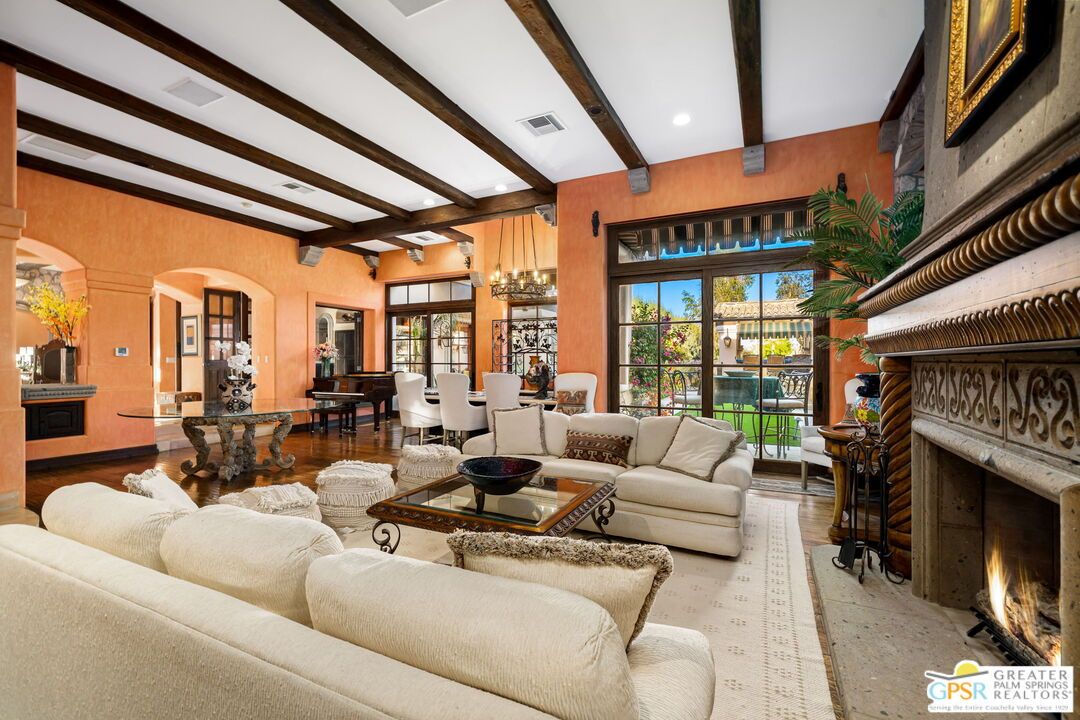 Chandelier, Dining room, Fireplace, Interior, Living room, Recessed Lighting, Wooden Beams, Wood Texture Flooring