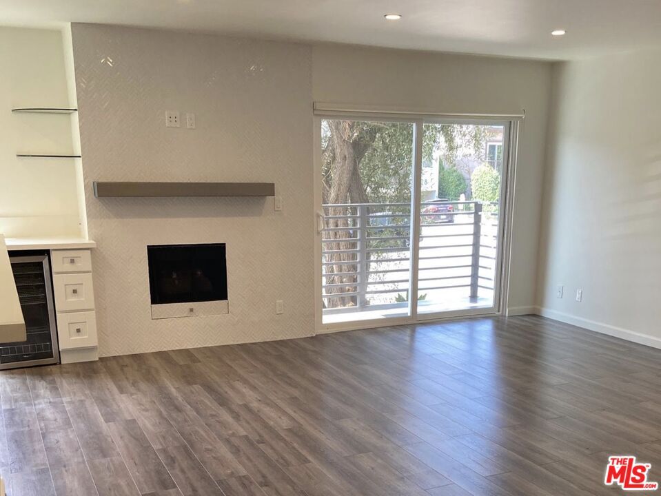 Empty room, Fireplace, Interior, Recessed Lighting, Wood Texture Flooring