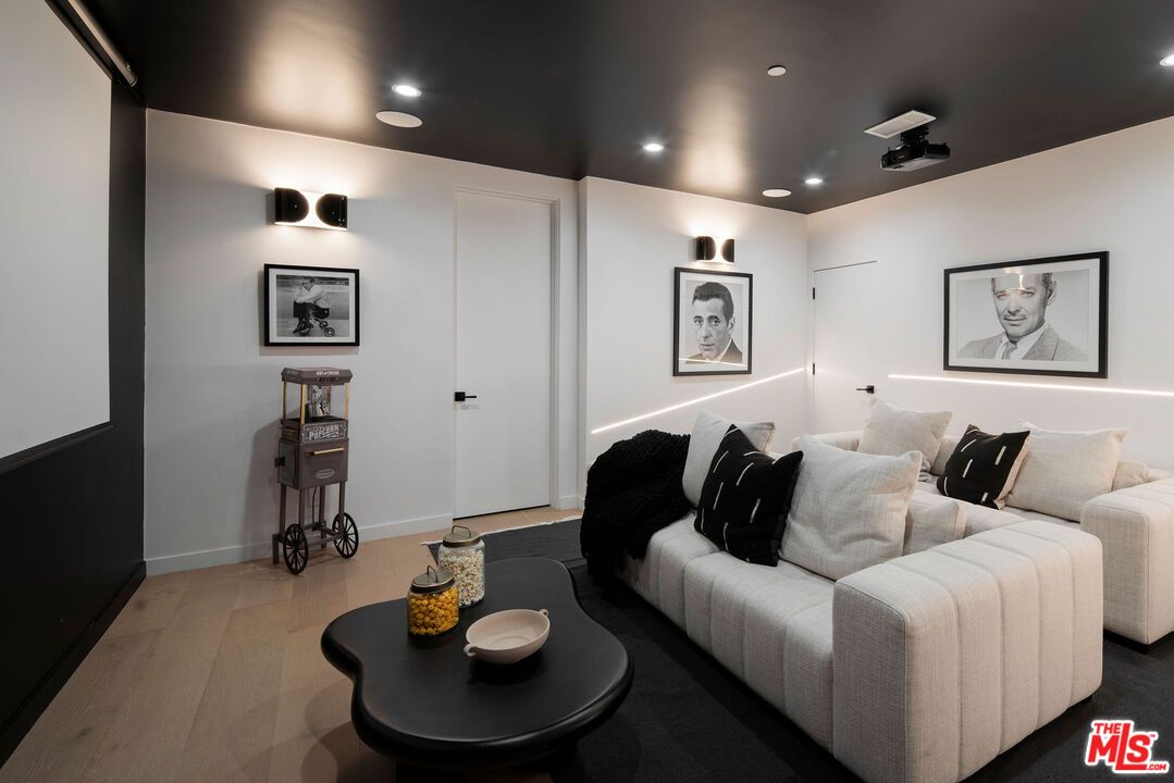 Interior, Living room, Projection Screen, Recessed Lighting, Wood Texture Flooring