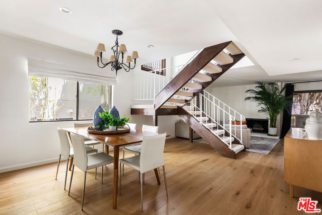 Chandelier, Dining room, Fireplace, Interior, Recessed Lighting, Wood Texture Flooring
