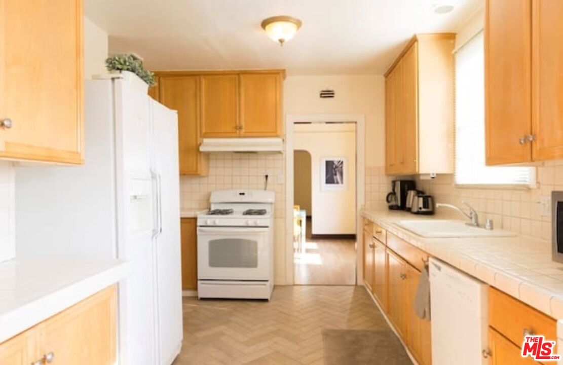 Interior, Kitchen, Tile Countertops, Wood Texture Flooring