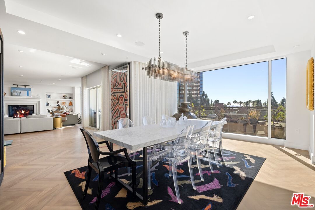 Chandelier, Dining room, Fireplace, Interior, Living room, Pendant Lights, Recessed Lighting, Wood Texture Flooring