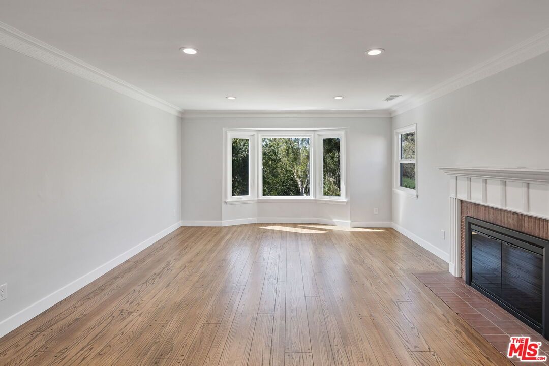 Empty room, Fireplace, Interior, Recessed Lighting, Wood Texture Flooring